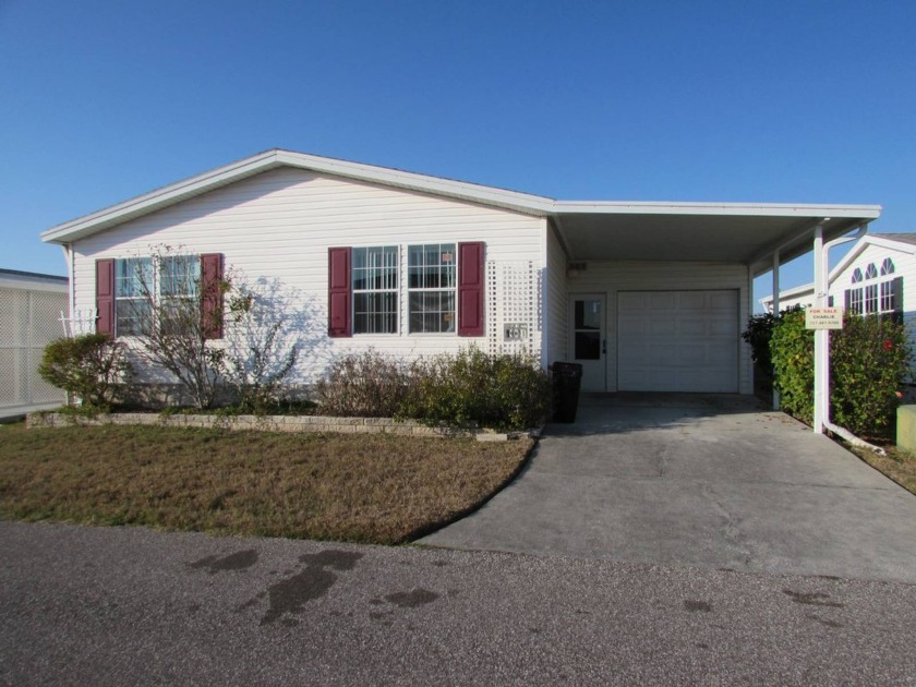 This beautiful 3 bedroom 2 bath Jacobsen with garage is on the - Beach Home for sale in Trinity, Florida on Beachhouse.com