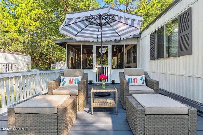 Step into The Tin Roof Inn-a residence filled with warmth and - Beach Home for sale in Sunset Beach, North Carolina on Beachhouse.com