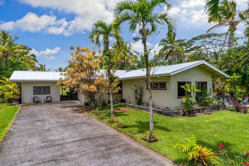 Experience the quintessential Hawaiian lifestyle in this - Beach Home for sale in Keaau, Hawaii on Beachhouse.com