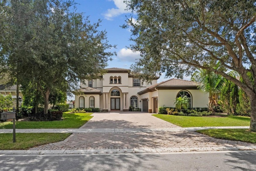 Well located resort style pool home in the popular gated - Beach Home for sale in Lake Worth, Florida on Beachhouse.com