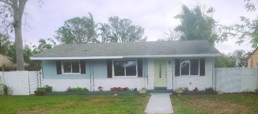 Welcome to this 3-bedroom, 2-bath charming coastal home - Beach Home for sale in Gulfport, Florida on Beachhouse.com