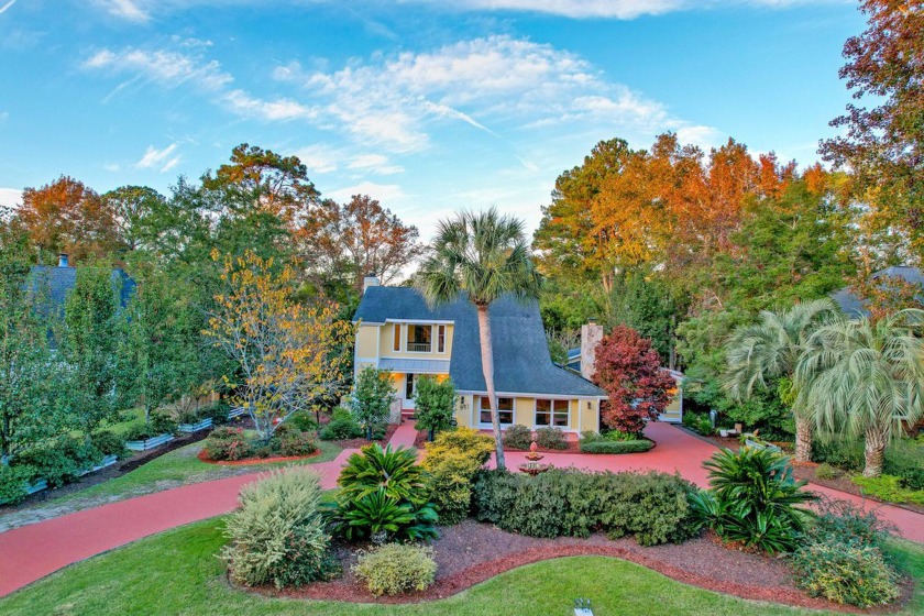 Set among majestic trees and lush landscaping in the highly - Beach Home for sale in Mount Pleasant, South Carolina on Beachhouse.com