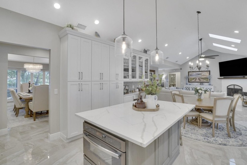 This beautifully upgraded single-story home sits on a sprawling - Beach Home for sale in Wellington, Florida on Beachhouse.com