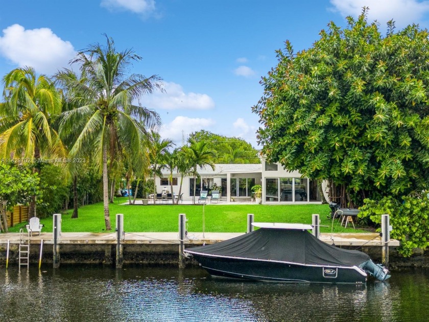 Urban oasis & boater's dream on an oversize lot. In this lush - Beach Home for sale in Pompano Beach, Florida on Beachhouse.com
