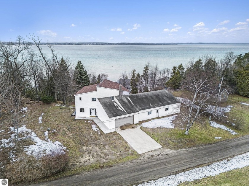 Tucked away on the highly coveted Old Mission Peninsula, this 4 - Beach Home for sale in Traverse City, Michigan on Beachhouse.com