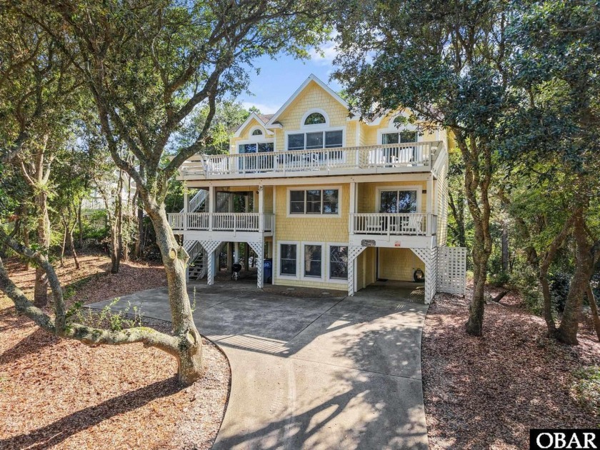 Tucked among coastal live oaks in desirable Corolla Light, this - Beach Home for sale in Corolla, North Carolina on Beachhouse.com