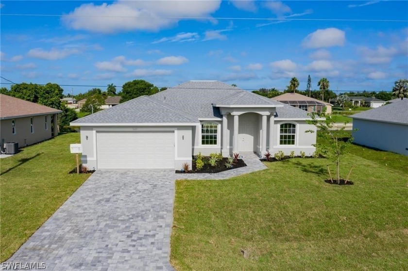 BRAND NEW CUSTOM HOME SITUATED in SW Cape Coral ON A FRESH WATER - Beach Home for sale in Cape Coral, Florida on Beachhouse.com