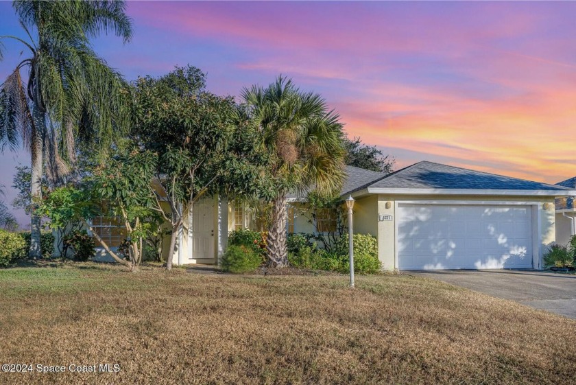 Stunning Lakefront! This move-in-ready 3-BD, 2-BA is nestled on - Beach Home for sale in Cocoa, Florida on Beachhouse.com