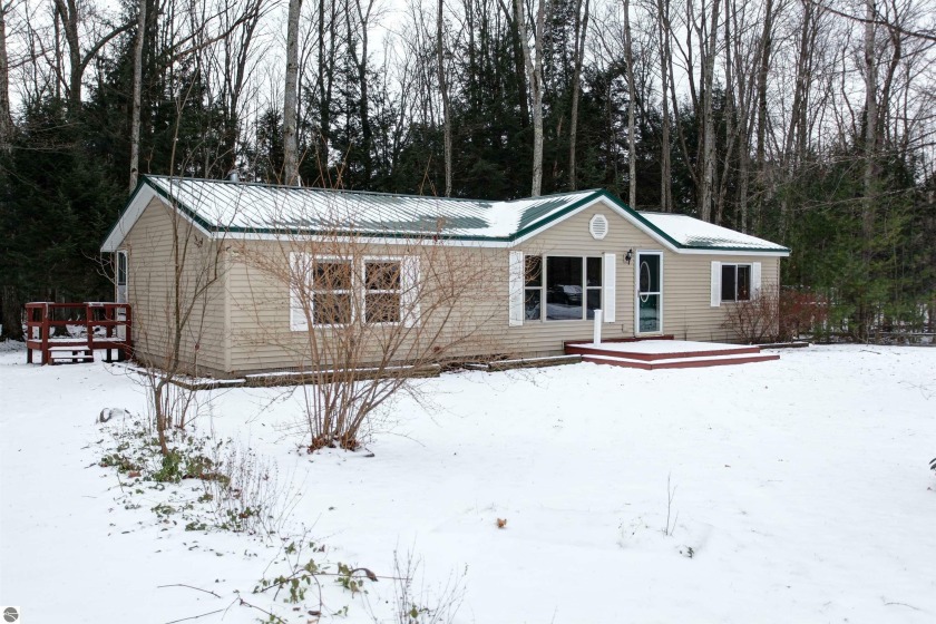 Immediate occupancy!  This lovely ranch home is set on just over - Beach Home for sale in Traverse City, Michigan on Beachhouse.com