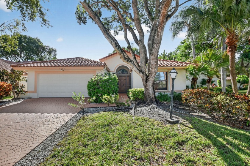 Welcome to this beautifully landscaped corner-lot home offering - Beach Home for sale in Boynton Beach, Florida on Beachhouse.com