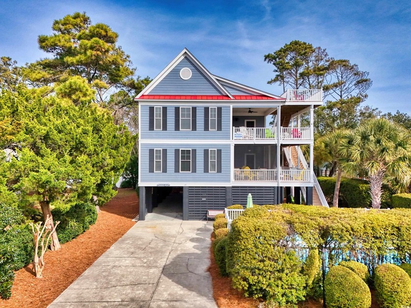 Experience the best of coastal living in this exceptional - Beach Home for sale in Pawleys Island, South Carolina on Beachhouse.com