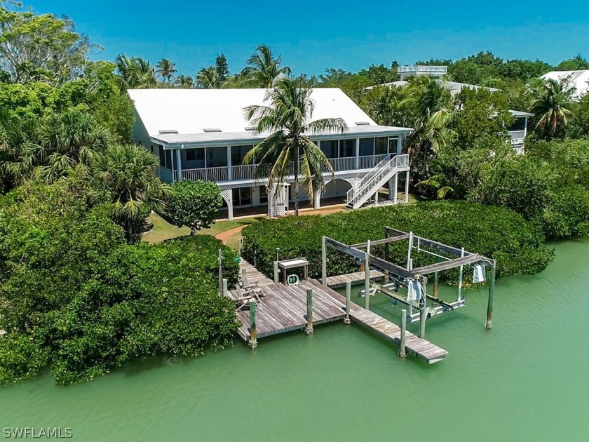 Dinkins Bayou and a preserve beyond are the stunning views from - Beach Home for sale in Sanibel, Florida on Beachhouse.com