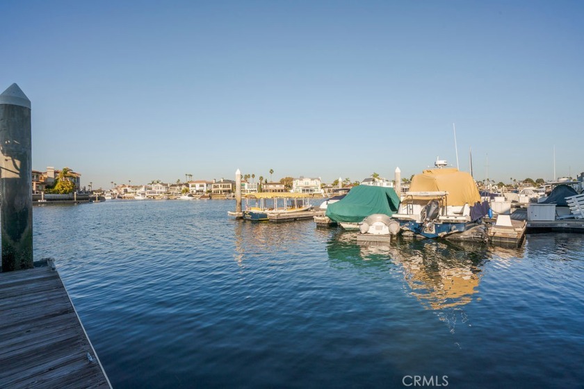 EXQUISITE AND A RARE FIND! This amazing waterfront townhouse is - Beach Condo for sale in Huntington Beach, California on Beachhouse.com