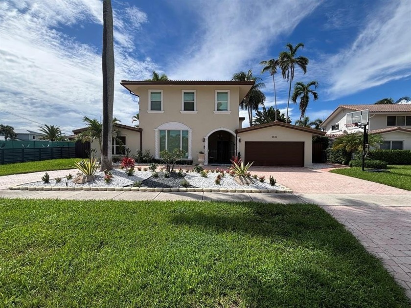 THIS SPLENDID ESTATE HOME WITH MAJOR UPGRADES! FEATURES 2 CAR - Beach Home for sale in Lighthouse Point, Florida on Beachhouse.com
