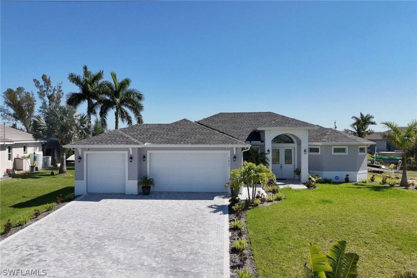 2023 GULF ACCESS POOL HOME WITH NEW DOCK AND BOAT LIFT (10,000 - Beach Home for sale in Cape Coral, Florida on Beachhouse.com