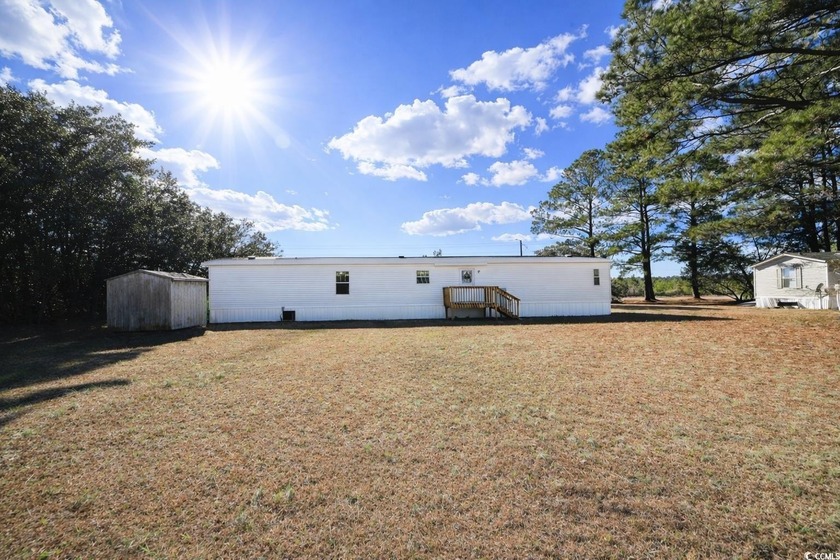 Carolina Country living! This single wide manufactured home - Beach Home for sale in Longs, South Carolina on Beachhouse.com