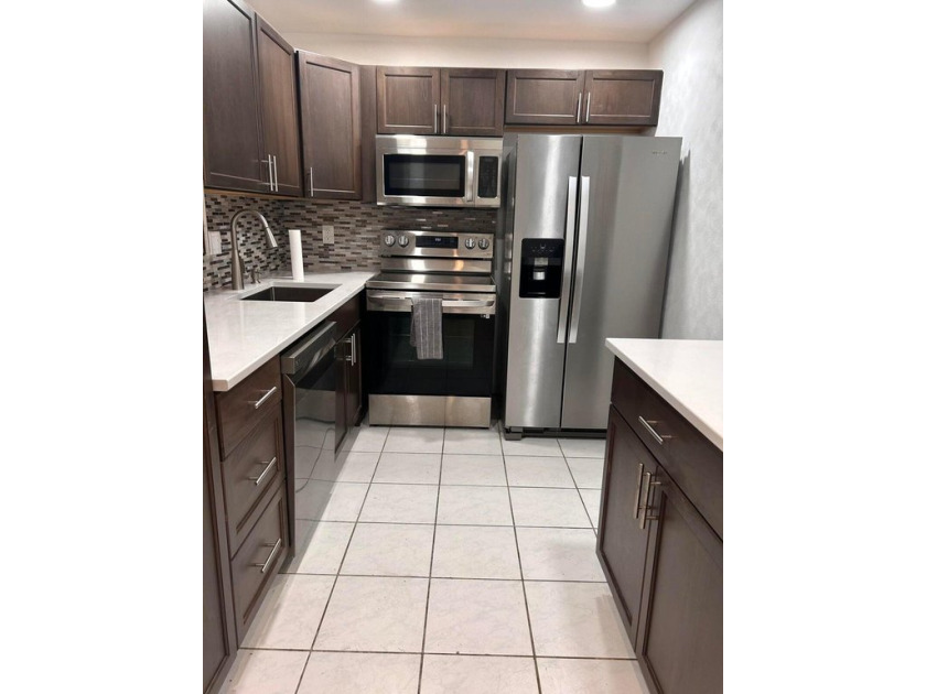 One bedroom, 1.5 bath, second floor, end unit next to stairs - Beach Condo for sale in Boynton Beach, Florida on Beachhouse.com