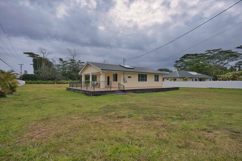 Charming and fully renovated, this 2-bedroom, 1-bath home offers - Beach Home for sale in Keaau, Hawaii on Beachhouse.com