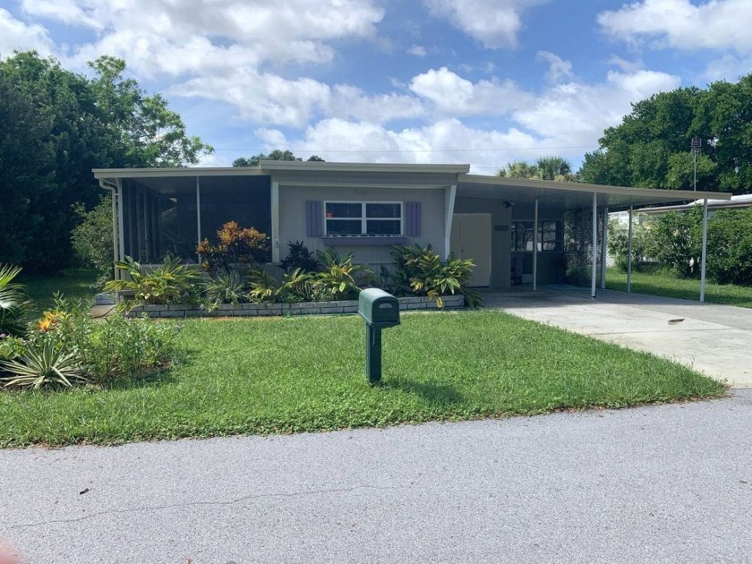 This is a WONDERFUL 2 Bedroom, 1.5 Bathroom FULLY FURNISHED home - Beach Home for sale in Dunedin, Florida on Beachhouse.com