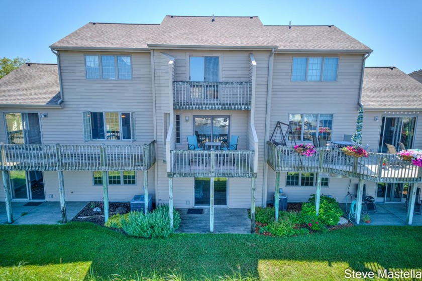 Experience breathtaking west-facing waterfront views and - Beach Condo for sale in Muskegon, Michigan on Beachhouse.com
