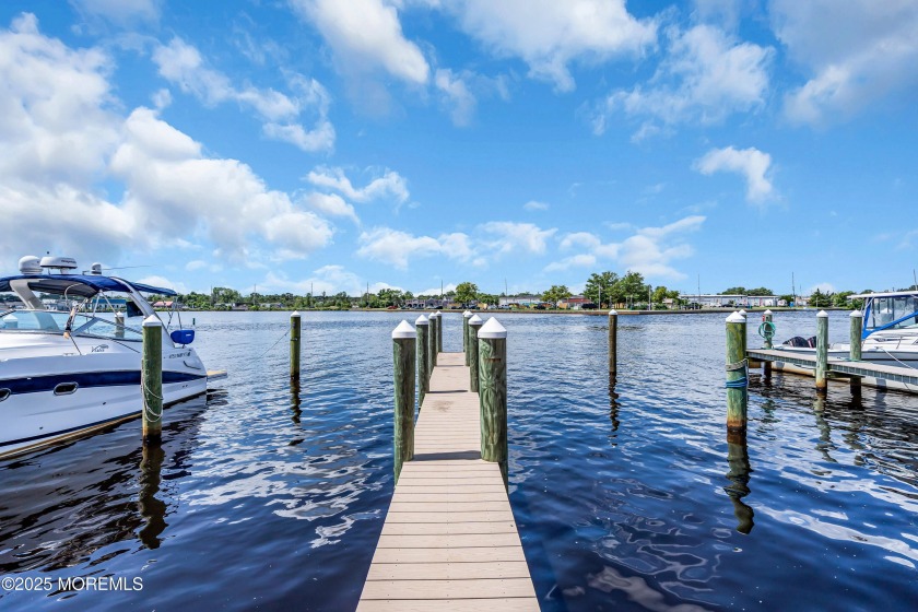 GREAT OPPORTUNITY TO BE ON THE WATER! First floor unit in one of - Beach Home for sale in Toms River, New Jersey on Beachhouse.com