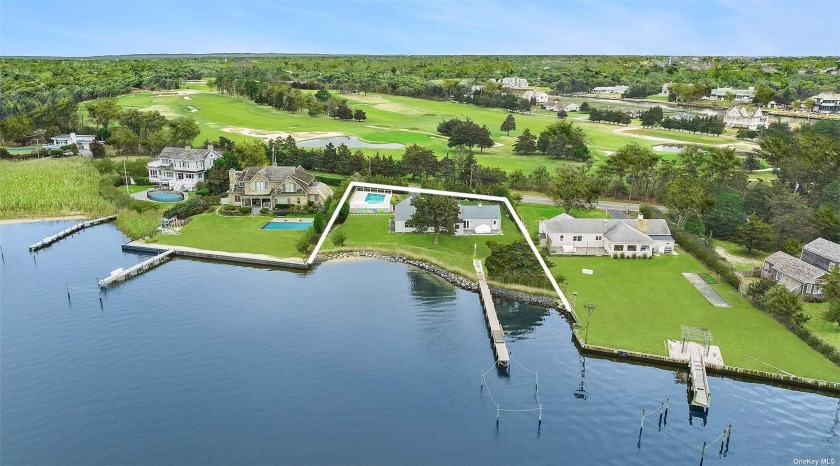 Nestled along the serene shores of Moriches Bay, this exquisite - Beach Home for sale in Westhampton, New York on Beachhouse.com