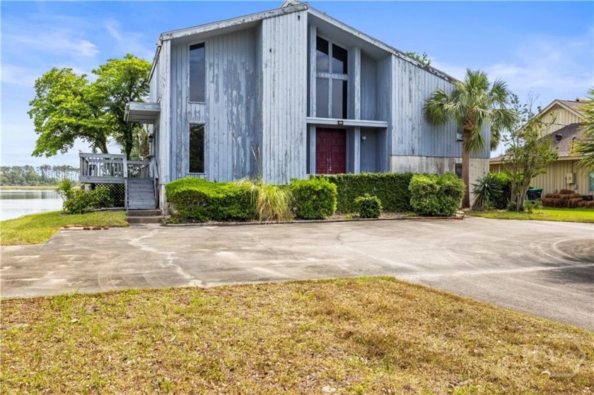 LOCATION! VIEWS!!! And more VIEWS!! This 1972 stylist home sits - Beach Home for sale in Savannah, Georgia on Beachhouse.com