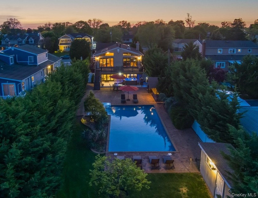 Waterfront luxury meets modern comfort at this reintroduced - Beach Home for sale in Massapequa, New York on Beachhouse.com