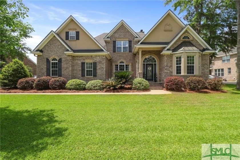 Experience the extraordinary in this custom-built full-brick - Beach Home for sale in Richmond Hill, Georgia on Beachhouse.com