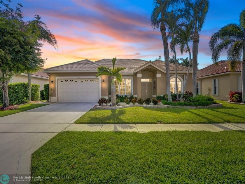 This Captivating home offers a bright Airy open floor plan with - Beach Home for sale in Lake Worth, Florida on Beachhouse.com