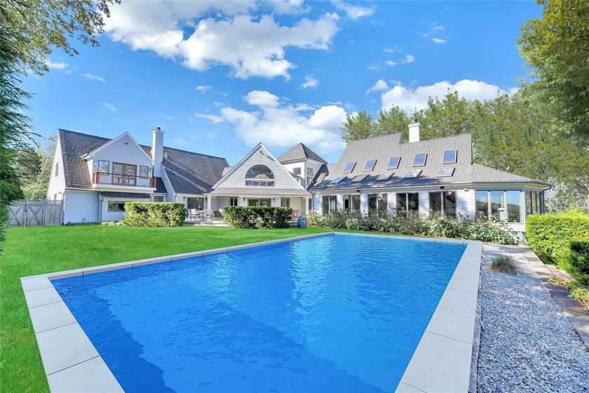An extraordinary waterfront retreat set on 3.5 acres, featuring - Beach Home for sale in Southold, New York on Beachhouse.com