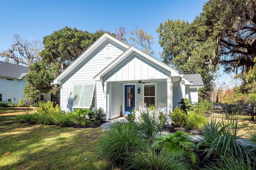 Nestled beneath a majestic live oak draped in Spanish moss, this - Beach Home for sale in Johns Island, South Carolina on Beachhouse.com