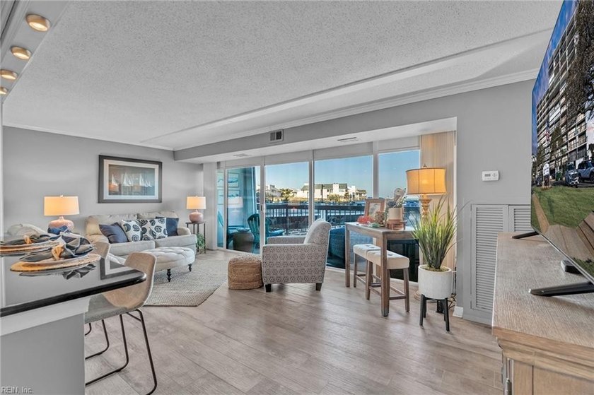 Beachfront living at its finest in a beautiful updated 2-bedroom - Beach Townhome/Townhouse for sale in Virginia Beach, Virginia on Beachhouse.com