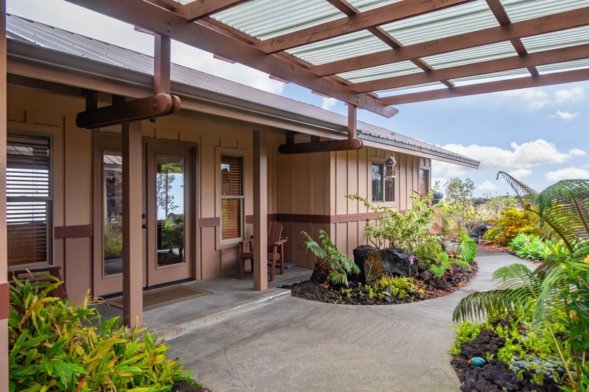 Set on a full acre overlooking South Point, this thoughtfully - Beach Home for sale in Ocean View, Hawaii on Beachhouse.com