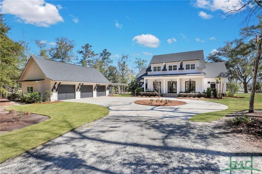 Nestled on 2.19 private acres this exquisite residence offers - Beach Home for sale in Richmond Hill, Georgia on Beachhouse.com