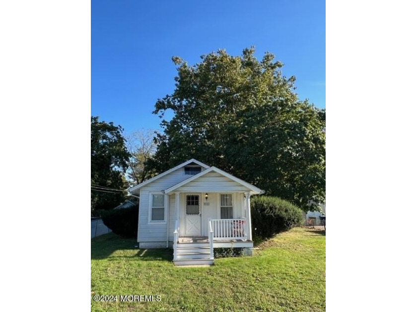 This well-maintained and updated two-bedroom home is full of - Beach Home for sale in Neptune, New Jersey on Beachhouse.com