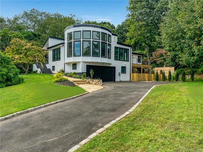 This stunning home features luxurious newly renovated heated - Beach Home for sale in Port Jefferson, New York on Beachhouse.com