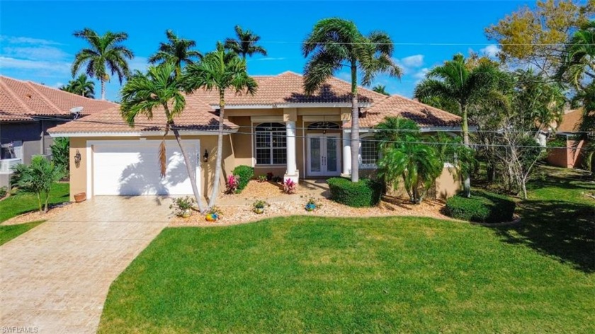 This is a beautiful waterfront home on an extremely wide - Beach Home for sale in Cape Coral, Florida on Beachhouse.com