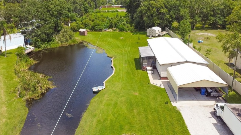 Welcome Home!! Come see this wonderful 3/4 ACRE waterfront - Beach Home for sale in Tampa, Florida on Beachhouse.com