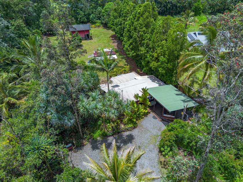 Tucked away in the lush beauty of Hawaiian Paradise Park, this - Beach Home for sale in Keaau, Hawaii on Beachhouse.com