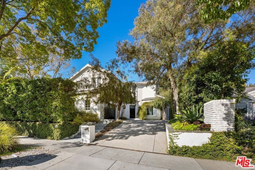 Tasteful White brick traditional set back and elevated from the - Beach Home for sale in Santa Monica, California on Beachhouse.com