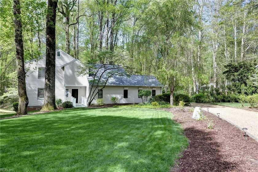 Located in a peaceful, wooded setting in Kingsmill, this - Beach Home for sale in Williamsburg, Virginia on Beachhouse.com