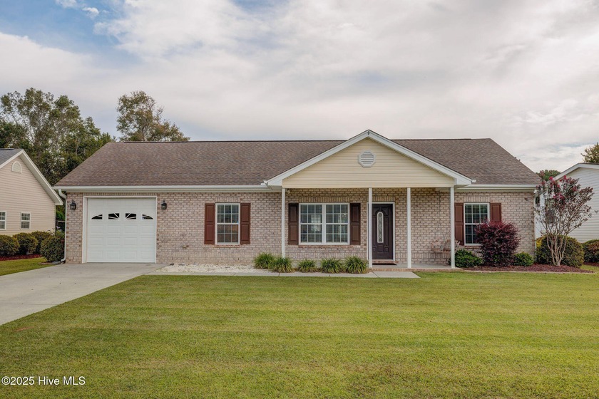 This charming 3-bedroom, 2-bathroom home offers a bright and - Beach Home for sale in Ocean Isle Beach, North Carolina on Beachhouse.com