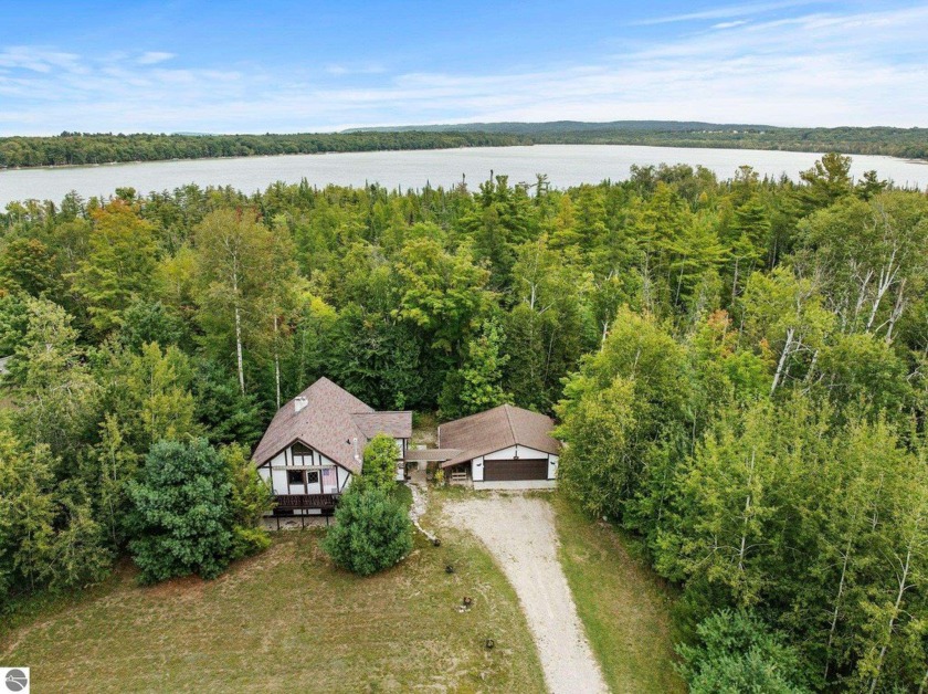 **Lakefront Chalet on Little Traverse Lake: Freshly Remodeled - Beach Home for sale in Maple City, Michigan on Beachhouse.com