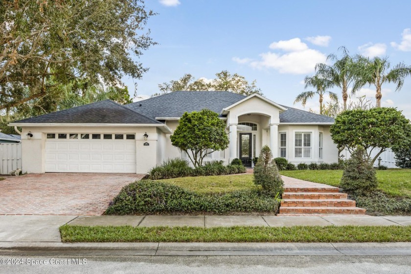 SPACIOUS, GORGEOUS, home in the GATED waterfront community of - Beach Home for sale in Merritt Island, Florida on Beachhouse.com