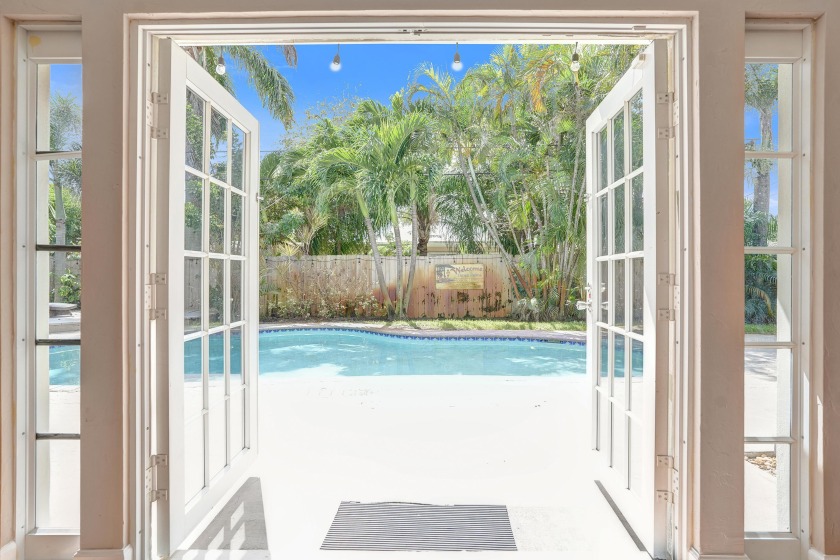 This beautifully 3-bedroom, 2-bath home is filled with natural - Beach Home for sale in Deerfield Beach, Florida on Beachhouse.com