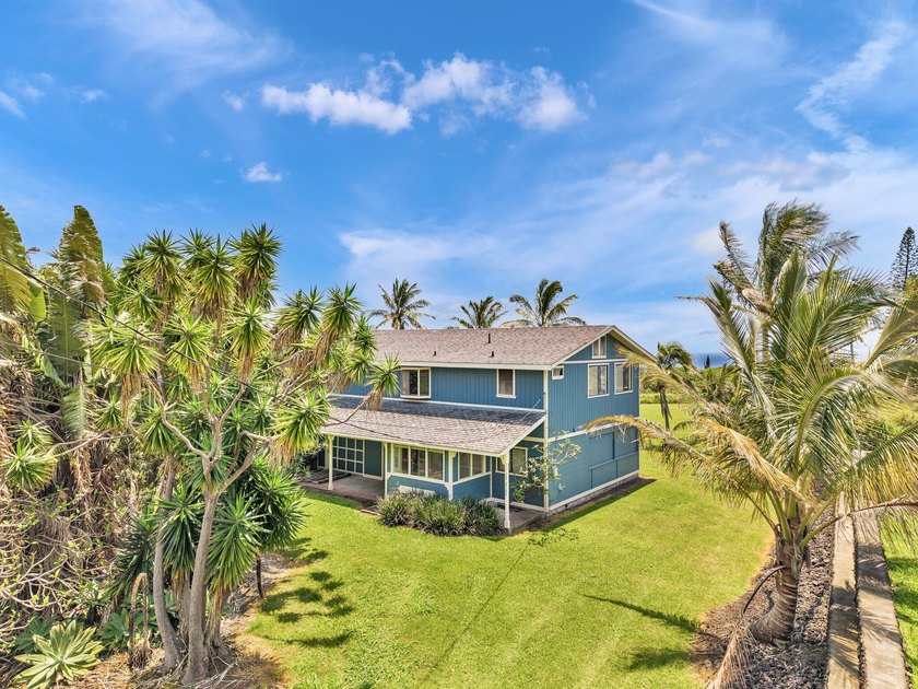 Golf Course Living with Ocean Views! Nestled along side a lush - Beach Home for sale in Naalehu, Hawaii on Beachhouse.com