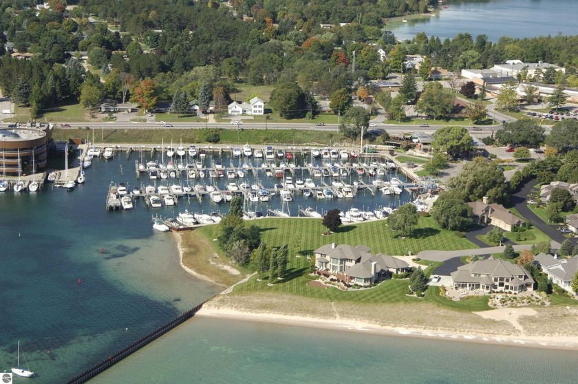 Welcome to a prime opportunity to secure your own boat slip in - Beach Lot for sale in Traverse City, Michigan on Beachhouse.com