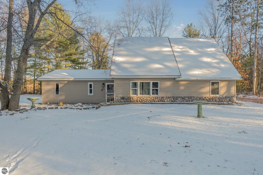 Welcome to the spacious home you've been looking for! This roomy - Beach Home for sale in Oscoda, Michigan on Beachhouse.com