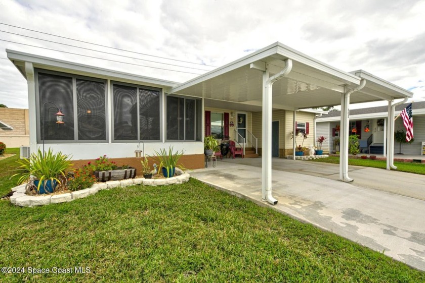 Extremely well maintained and has 2 carports!!! A convenient way - Beach Home for sale in Cocoa, Florida on Beachhouse.com